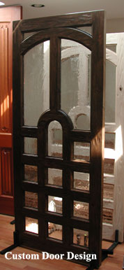 Unique mahagany front door with seedy baroque glass